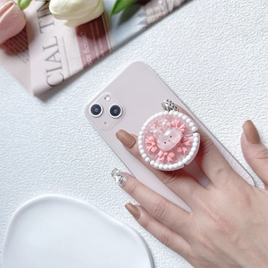 3D pink resin rabbit phone grip stand with sweet bow and beads on a pink phone case