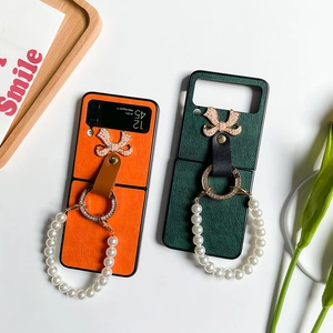 Coque en cuir pour Samsung Galaxy Z Flip6 avec bracelet de perles et anneau nœud papillon