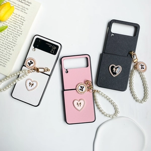 Luxury Foldable Phone Case For Samsung Galaxy Z Flip Saffiano Leather Texture Heart Bow Artificial Pearl Hand Strap Elegant