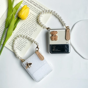 Clear Z Flip 6 case with pearl handle featuring bear and honeybee charms for women