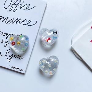 Transparent heart-shaped expanding phone socket with glitter and floral inserts