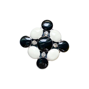 Black and white checkered pattern phone socket with crystal gems in minimalist retro style