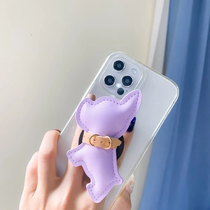 Detail of purple faux leather French bulldog phone socket on a clear iPhone case