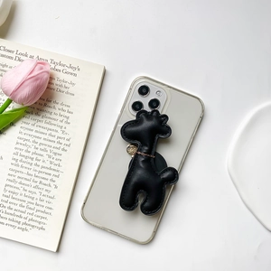 Minimalist black leather giraffe phone grip with gold chain on clear case