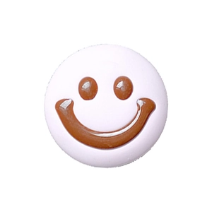 Pink telescopic phone socket with brown smiley face pattern for desktop stability