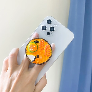 Detailed view of a 3D simulated burger phone socket with mirror on a white smartphone