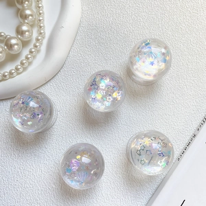 Glittering heart sequins inside transparent phone grips with aurora shell shimmer effect