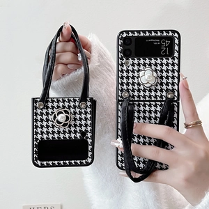 Samsung Z Flip case with camellia pearl detail and houndstooth texture hand strap