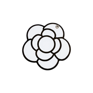 Minimalist black and white camellia flower phone socket mount with a built-in mirror