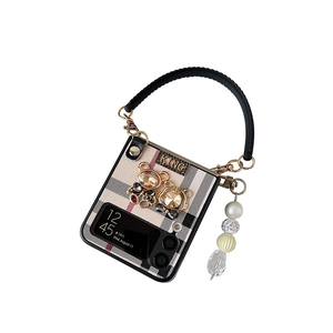 Checkered Samsung Z Flip 4 case featuring crystal bears and elegant pearl chain handle