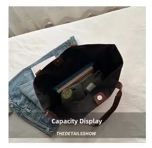 Interior view of brown suede tote bag showing large capacity for daily essentials
