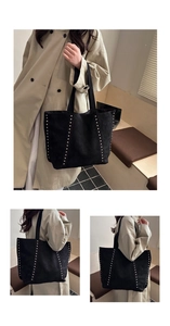 Three-way view of a black studded tote bag showing its large capacity and matte finish