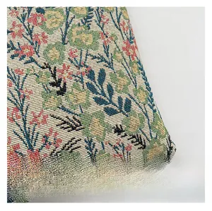 Macro view showing high-density woven fabric texture with intricate floral pattern details