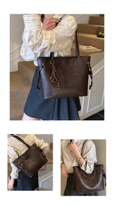 Macro detail of dark coffee tote bag with golden hardware and pretzel charm accessory