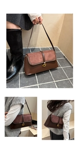 Detail of vintage brown baguette bag with matte leather flap and gold G-buckle