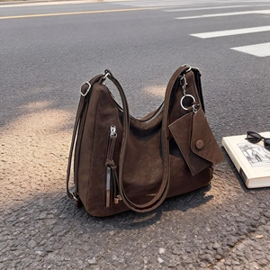 Retro dark brown matte leather tote bag with a matching mini pouch on a long strap
