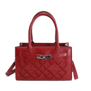Elegant red structured box handbag with crown embroidery and silver interlocking clasp