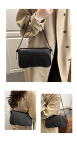 Elegante borsa sottobraccio nera con fondo ondulato unico e pelle liscia