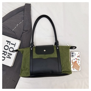 Detail view of large-capacity vintage tote bag with contrast stitching and pocket
