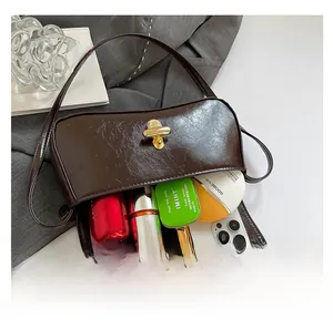 Detail view of the spacious inner compartment of the vintage brown baguette bag