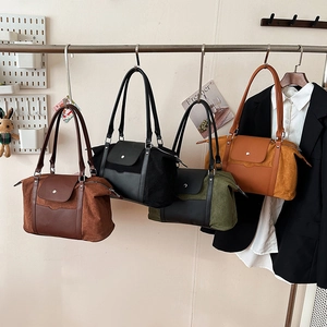 Large capacity travel tote bag in four classic colors with suede and leather texture