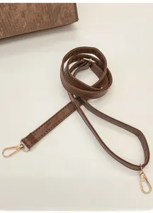 Adjustable brown faux leather shoulder strap with gold metal hooks for handbags