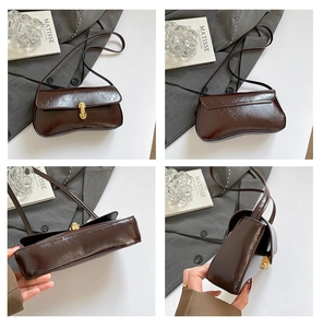 Multiple views of dark brown oil wax leather baguette bag with gold metal clasp