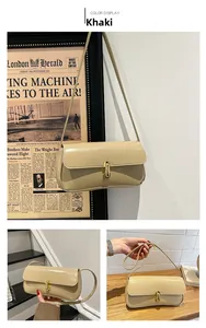 Detail view of khaki baguette shoulder bag with gold capsule clasp in various angles