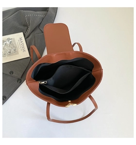 Internal view of brown pebble leather tote bag with a spacious zip compartment