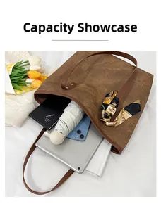 Brown tote bag interior showing large capacity for iPad, phone, and diary with silk scarf detail