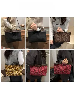 Detailed views of leopard print faux suede tote bag worn as handbag and crossbody