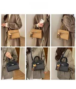 Detail view of woven leather handbags with metal locks and decorative scarf accents