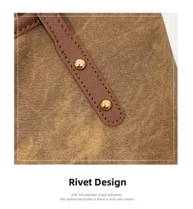 Macro view of brown textured canvas tote with stylish golden spherical metal rivets