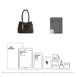 Macro view of dark brown suede tote with pearl pendant and 11-inch iPad storage