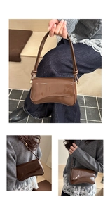 Detail view of dark brown patent leather shoulder bag with knot strap and gold hardware