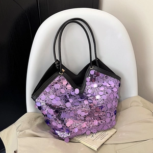 Purple sequin bucket tote bag with black leather handles for stylish everyday wear