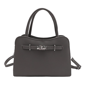 Minimalist dark gray square handbag with wavy top handle and silver twist lock closure