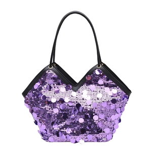 Fashionable purple sequin tote bag with large reflective scales and black leather handles