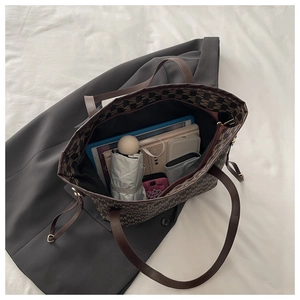 Interior view showing the large storage capacity of the vintage printed tote bag