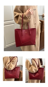 Macro shot of dark red leather tote featuring geometric stitching and gold branding