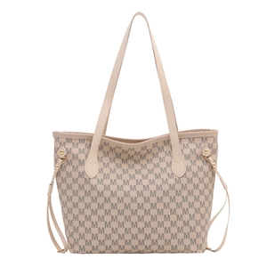 Beige tote bag with all-over M-letter print and gold metal accents for daily commute
