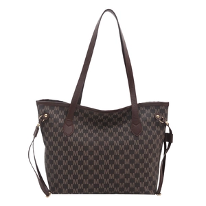Deep brown tote bag with M-letter jacquard pattern and golden metallic hardware