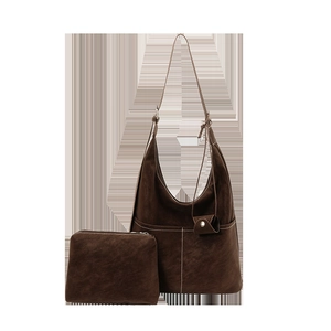 Brown matte suede tote bag with white stitching and matching zipper pouch for commute