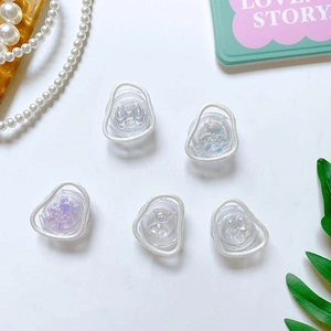 Iridescent acrylic phone grip set featuring 3D bears and floral bow decorations