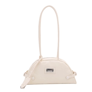 Minimalist cream dumpling shoulder bag with long straps and silver logo plate