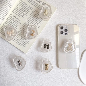 Cute resin bear and bowknot expanding phone grip on transparent protective case