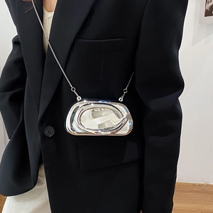 Detail of silver mirror texture D-shaped mini crossbody bag with metallic chain