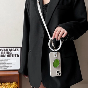 White iPhone case with green stand and leather wrist strap shown on professional model