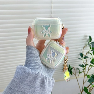 Étui laser iridescent pour AirPods avec breloque d'ours 3D et dragonne assortie