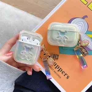 Coque laser ours irisée pour AirPods avec breloques métalliques luxe et dragonne
